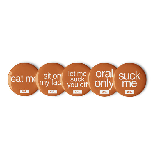 Pin badges featuring "Eat me" and "Sit on my face"