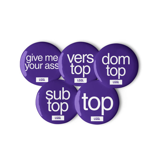 Selection of queer pride accessories - pin badges