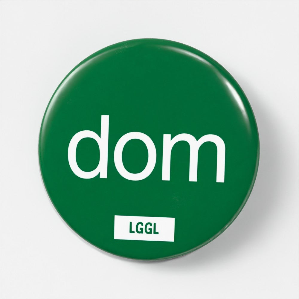 Gay fetish pin badge printed with "Dom" - dominant vers kink role badge by LetGoGetLaid