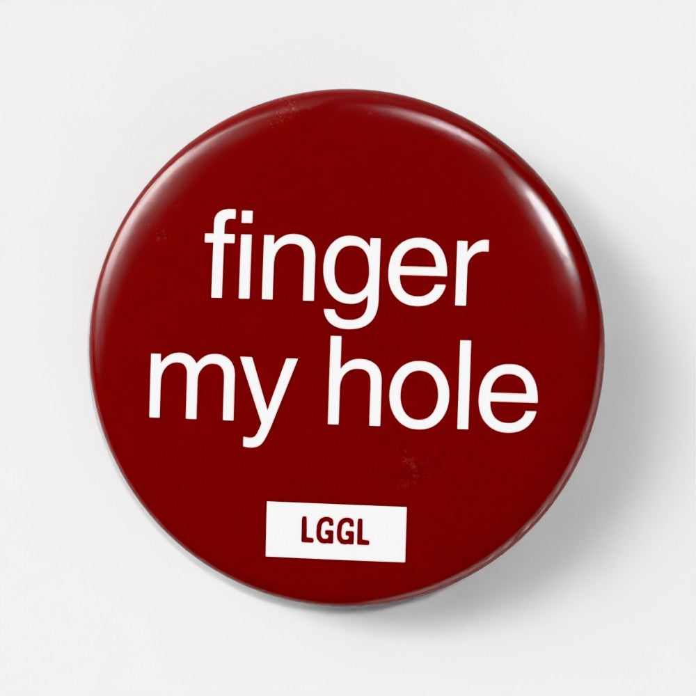 Gay assplay pin badge with "Finger My Hole" text - fingering fetish signal for cruising spots