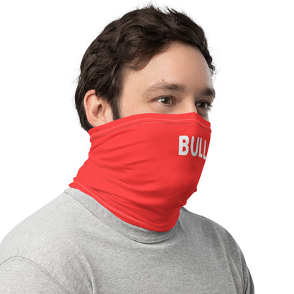 Male model wearing a red neck gaiter with kinky 'BULL' printed on it 