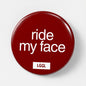 "Ride My Face" fetish pin - face-riding kink signal for darkrooms and cruising spots