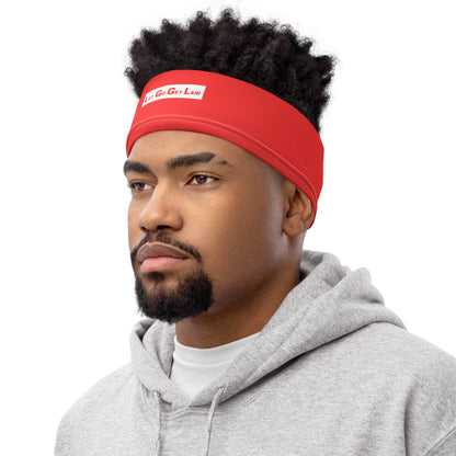 Man wearing a red kinky headband with a LGGL logo on a white background