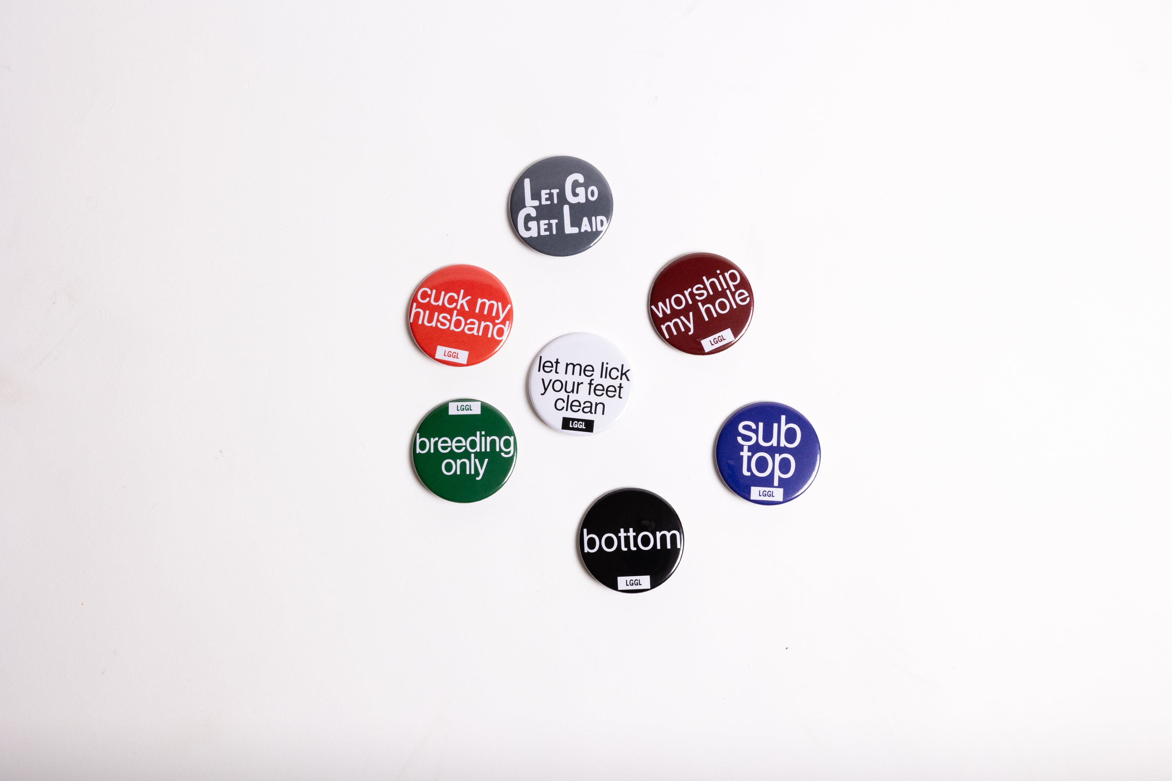 Collection of fetish pinback buttons from LetGoGetLaid