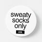 "Sweaty feet only" text shown on a round white pin badge