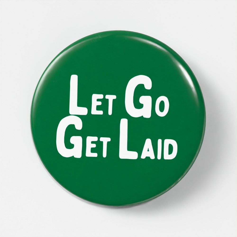 56mm gay vers pin badge featuring the LetGoGetLaid logo - kink accessories for versatile men