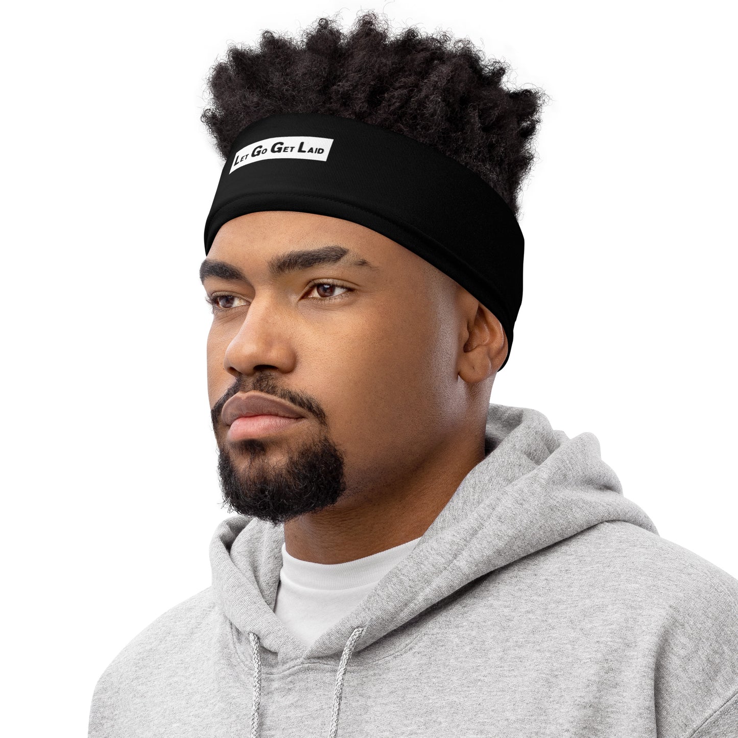 Man wearing a black face cover with "Let Go Get Laid" text temporarily placed on the forehead.