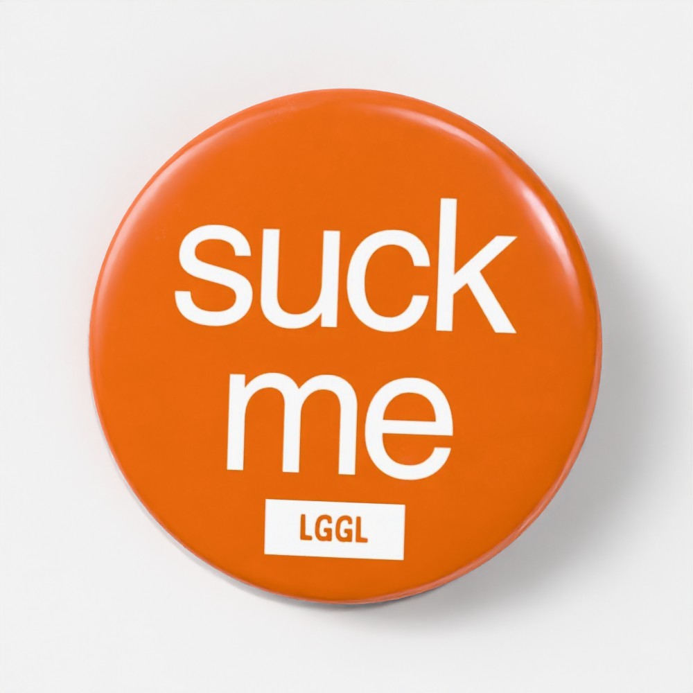 LGGL pin badge with "Suck me" text