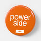 Orange pin badge with "Power side" text from Let Go Get Laid