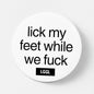 White pinback button featuring statements about licking feet