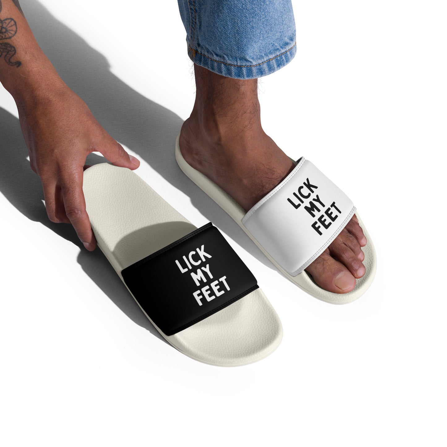 White slides with 'LICK MY FEET' text on a white background