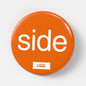 Orange LetGoGetLaid pin badge with "Side" text