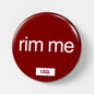 Party gear - a pin badge with "rim  me" text