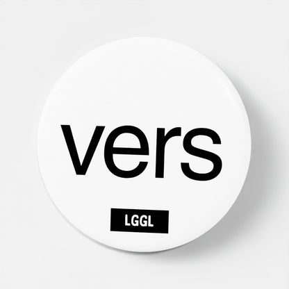 Round white pin badge with "vers" text