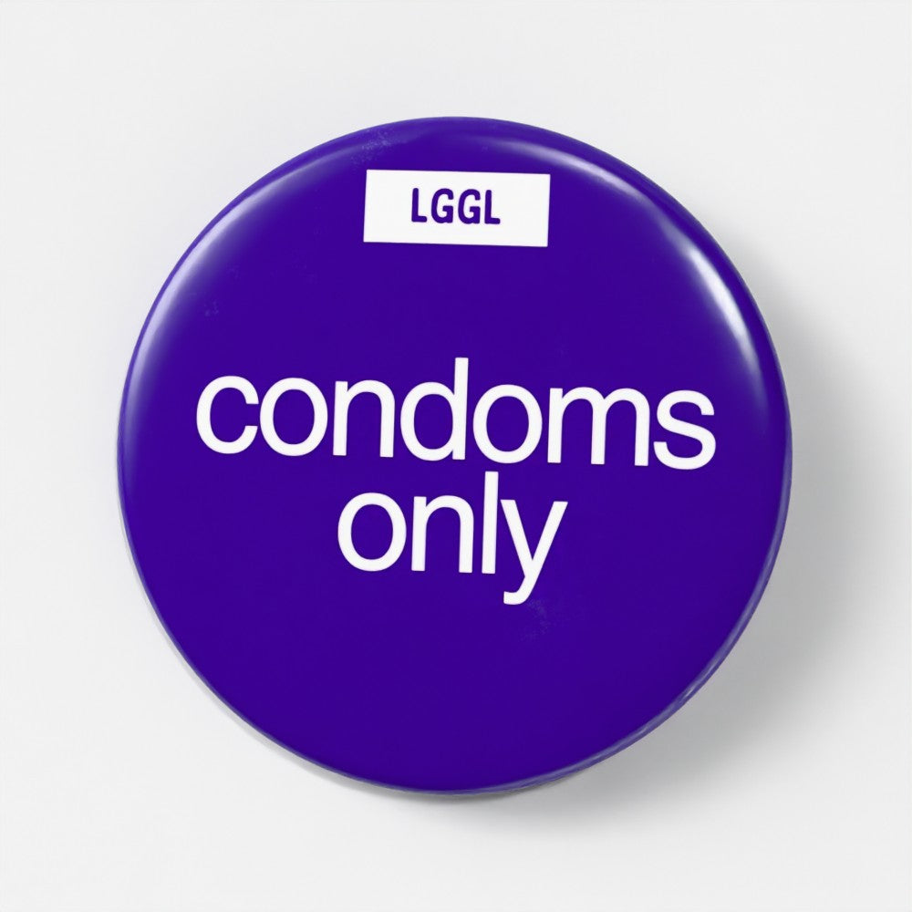 LGGL pin badge promoting safe sex and condoms