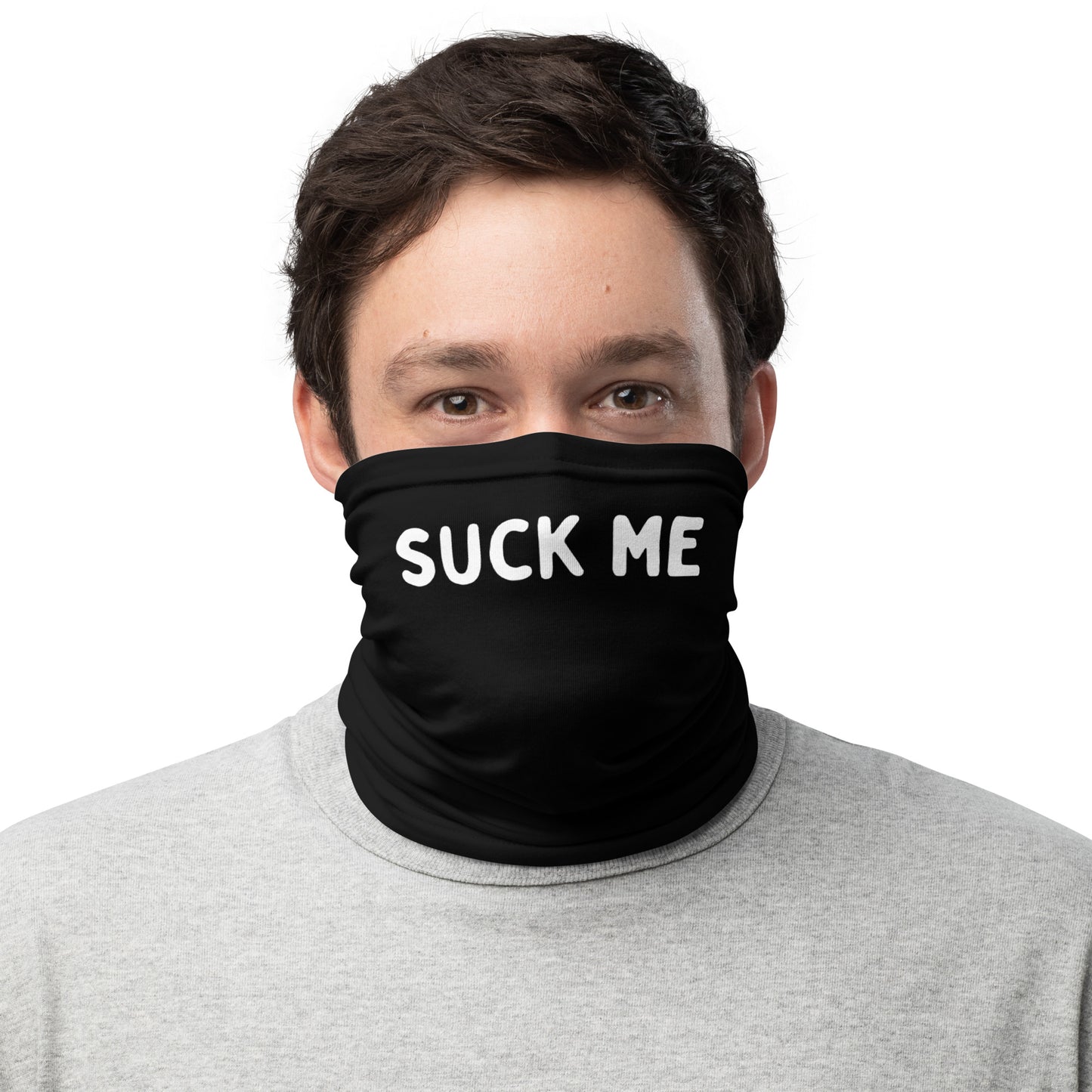 Gay man wearing a mask with "Suck Me" text