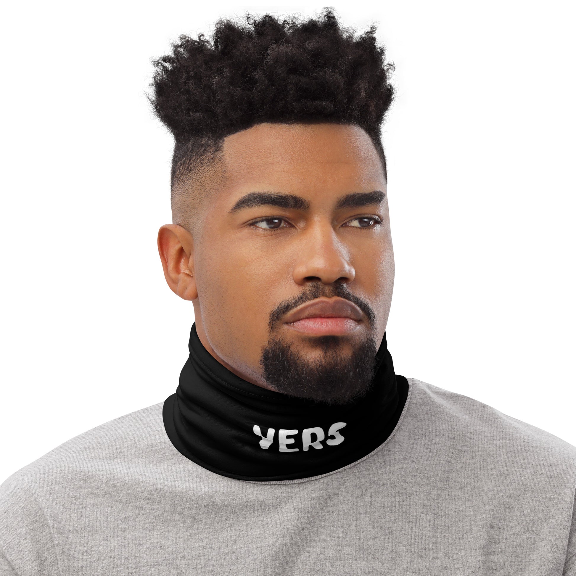Model wearing a Black Face Cover for Cruising Parties with his Position written on it "VERS"